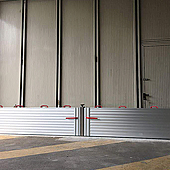 Anti flooding barriers for industrial and warehousing facilities